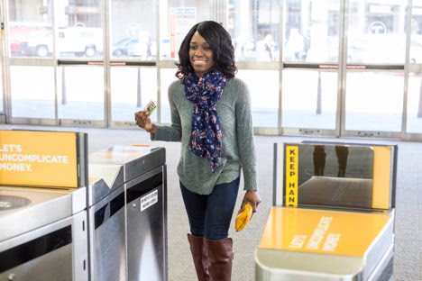 Customer scanning into a fare gate